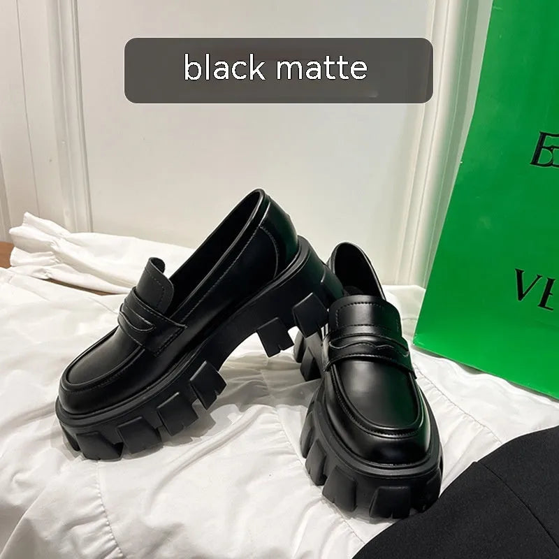 British style wide fit patent leather loafers with a rubber sole, shown in a matte finish.