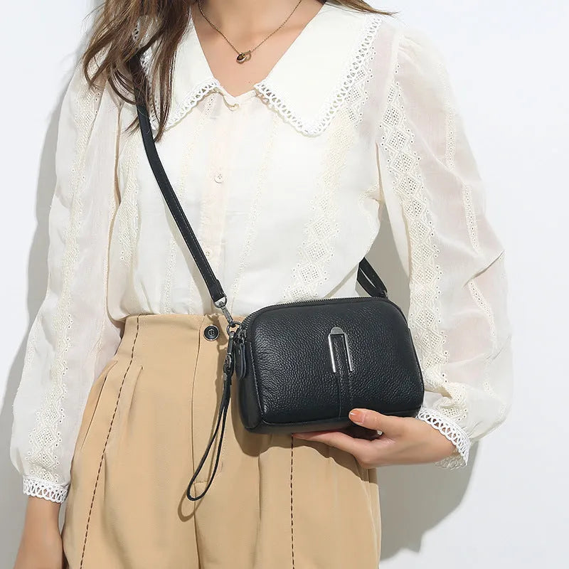 Genuine leather women's shoulder bag in urban square design, shown in dark khaki colour.