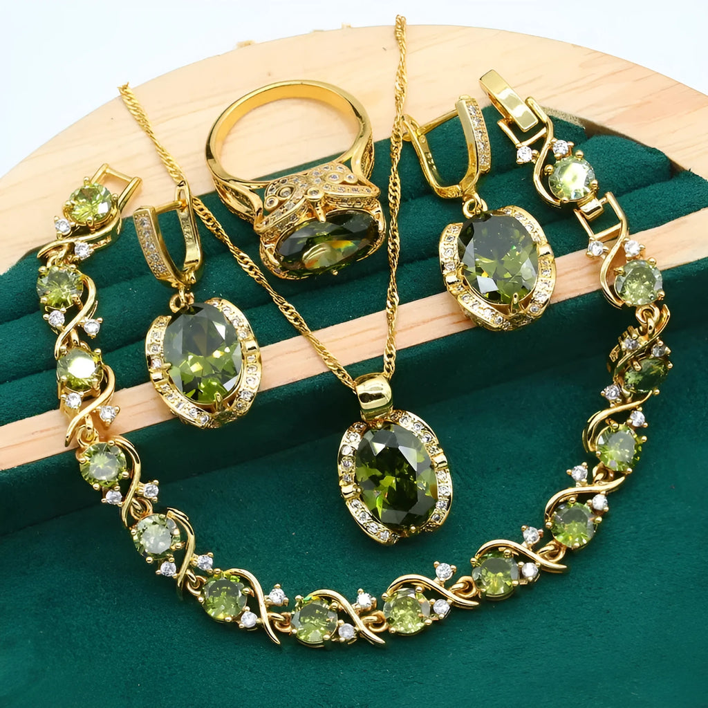 Olive green rhinestone zircon jewellery set with snake bone chain necklace, matching earrings, and ring.
