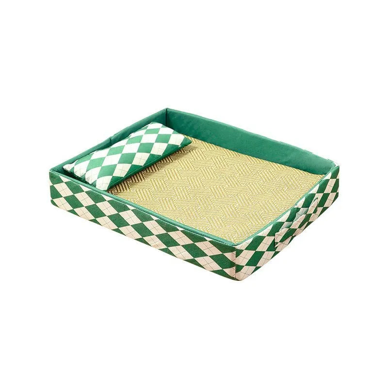 Blue rattan cat bed with attached washable fabric pad, shown in a medium size.