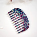 Acetate retro hair comb in cherry blossom powder colour, size 10x6.2cm, compact design