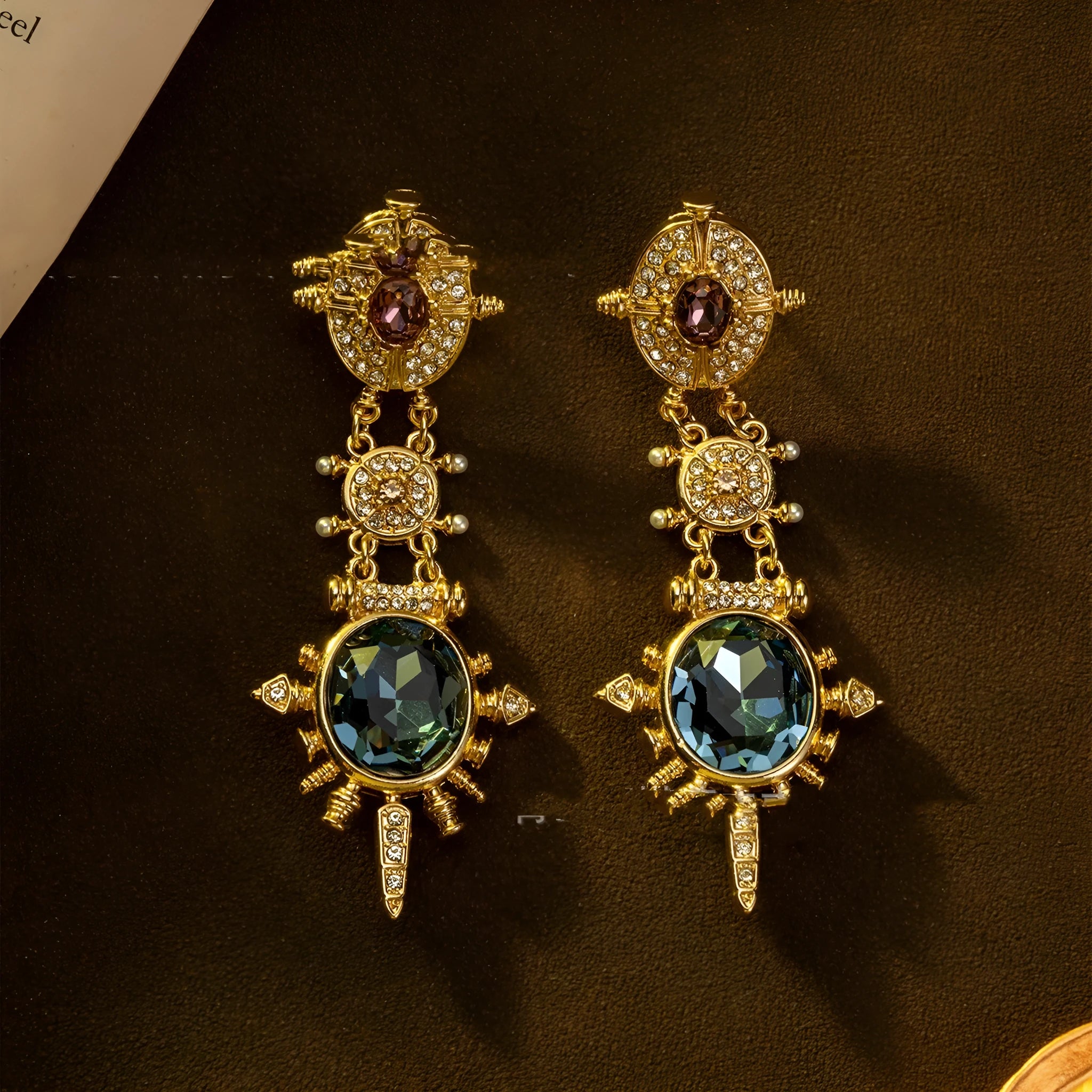 Gold geometric retro stud earrings with diamond treatment and round elements