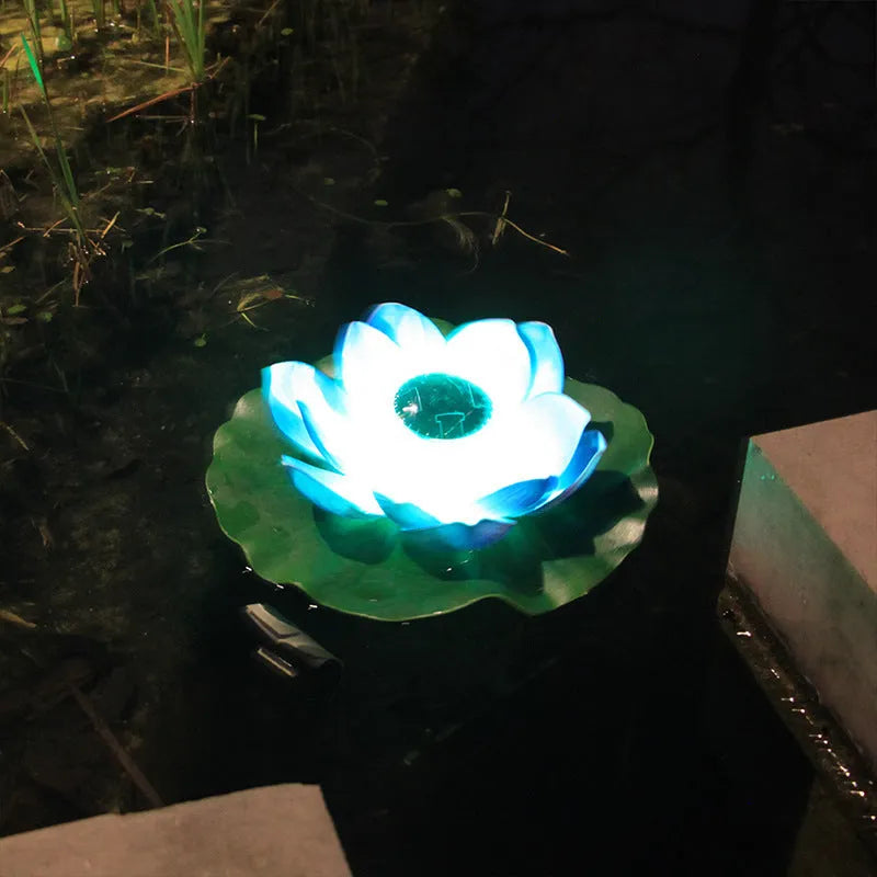 Floating solar lotus lamp on pond water with colourful LED light