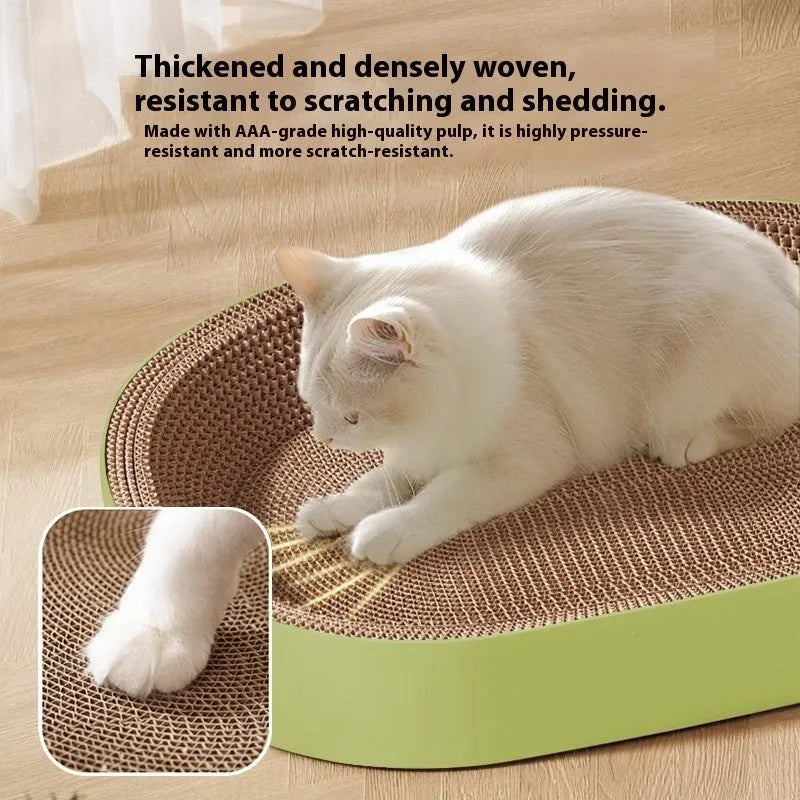 Green oval corrugated paper cat scratch board and nest showing textured surface and 55cm diameter.