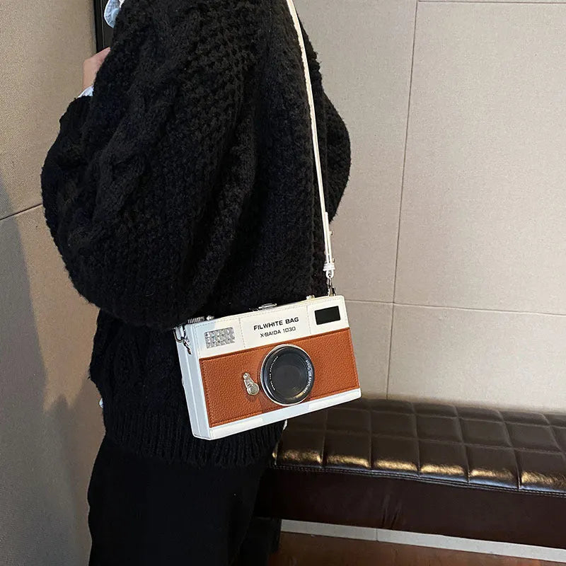 Mini crossbody camera bag in horizontal square shape with chain shoulder strap