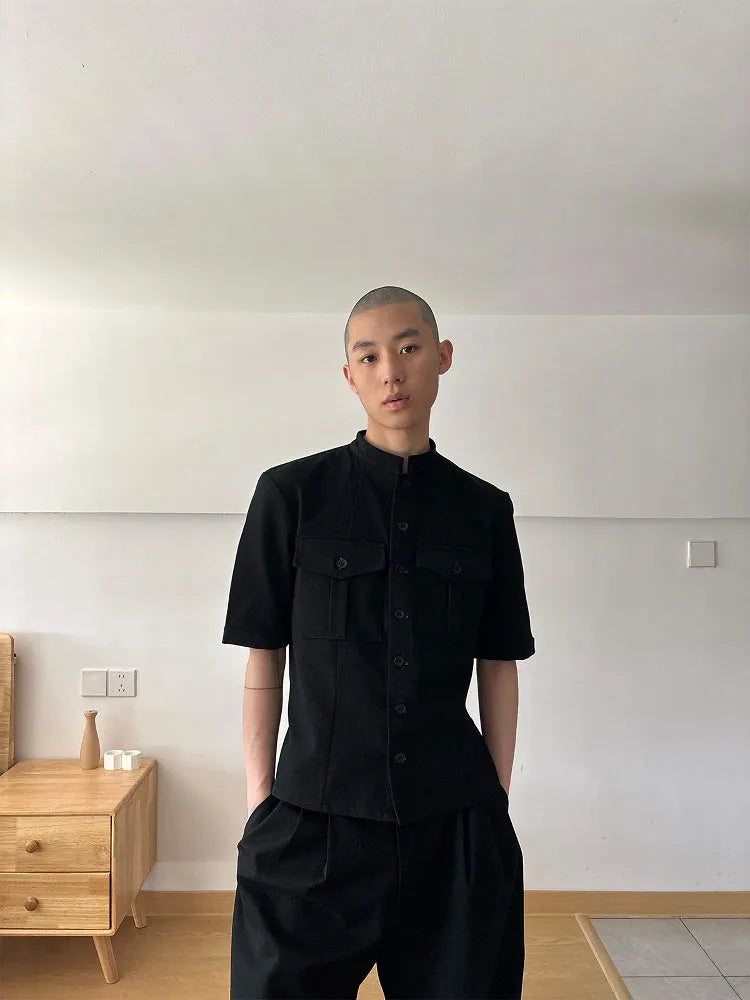 Handmade black half-sleeve hunting shirt with a shirt collar and single-breasted placket.