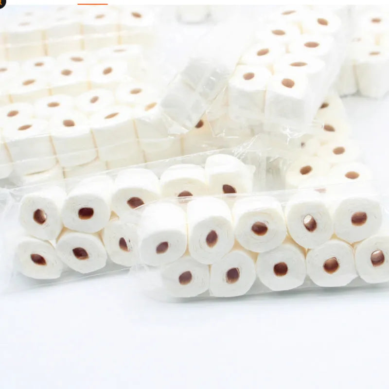 Miniature paper model of a tissue roll for children's play, measuring 30mm by 15mm by 80mm.