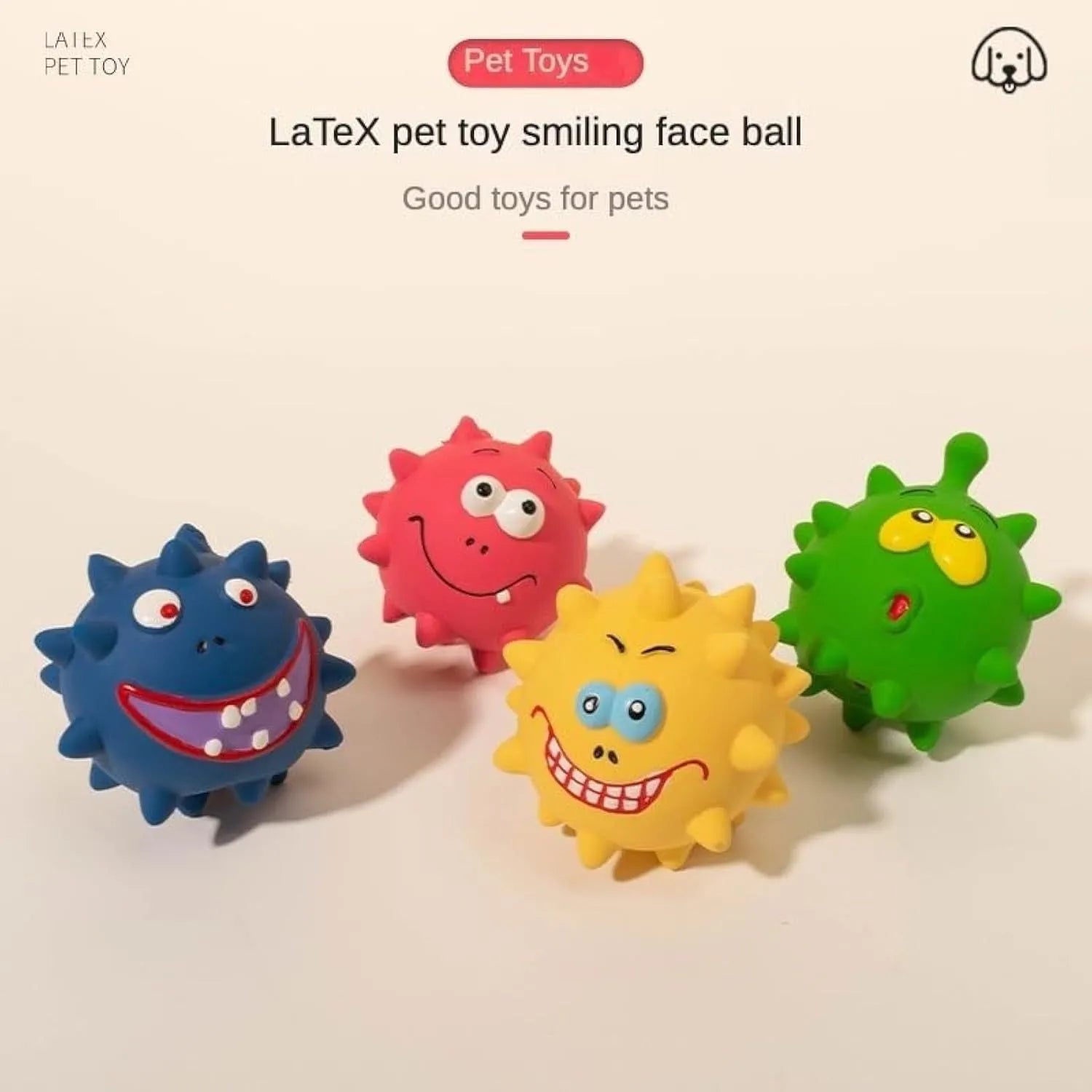 Set of four coloured latex squeaky dog balls with cute faces, shown next to a dog.