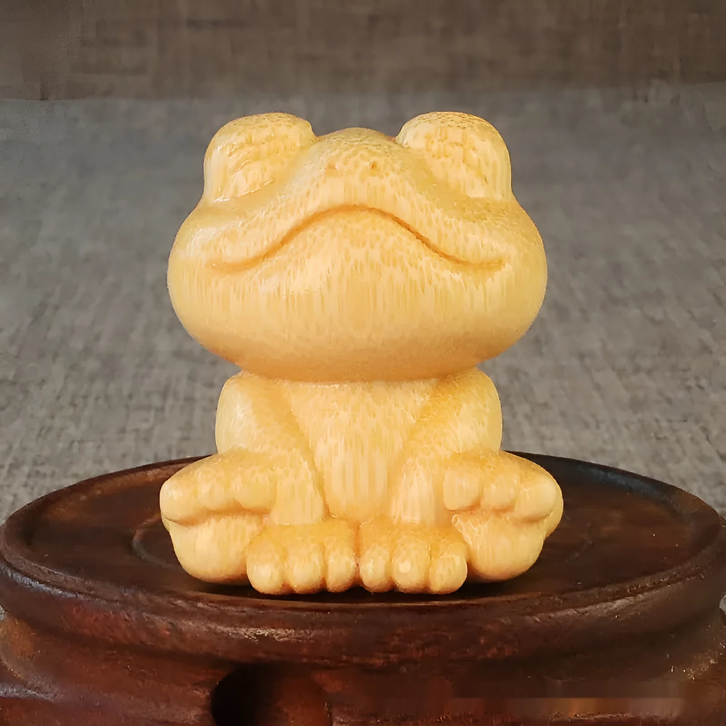 Solid bamboo smiling frog carving ornament with cartoon style measuring 5cm tall