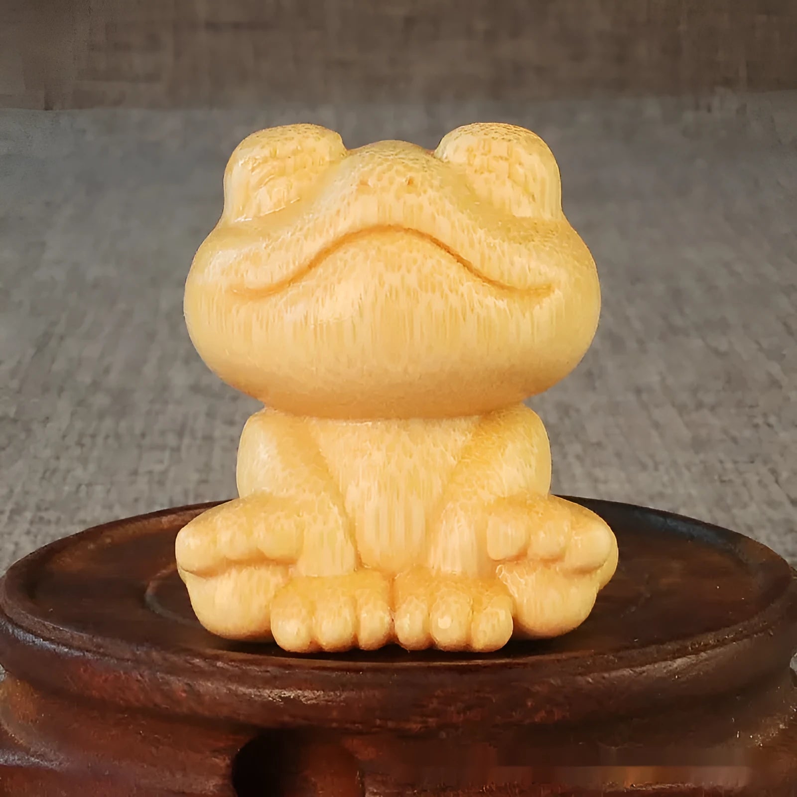 Solid bamboo smiling frog carving ornament with cartoon style measuring 5cm tall