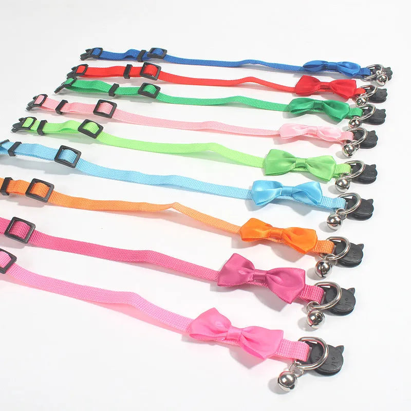 Adjustable nylon cat collar with decorative bow and bell in striped pattern multiple colours