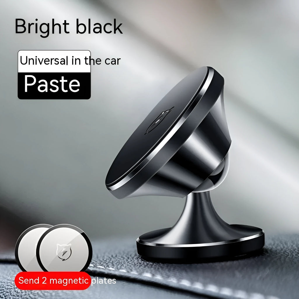 Shiny black magnetic car phone holder with adhesive dashboard mount on a car interior.