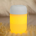 White cylindrical USB mini humidifier with charging cable