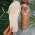 Women's transparent PU casual slippers in brown colour showing flat design and slip-on style