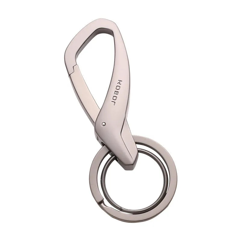 Zinc alloy double ring keychain in black, chrome, or nickel colour, shown with dimensions 8.3 by 3.5 cm.