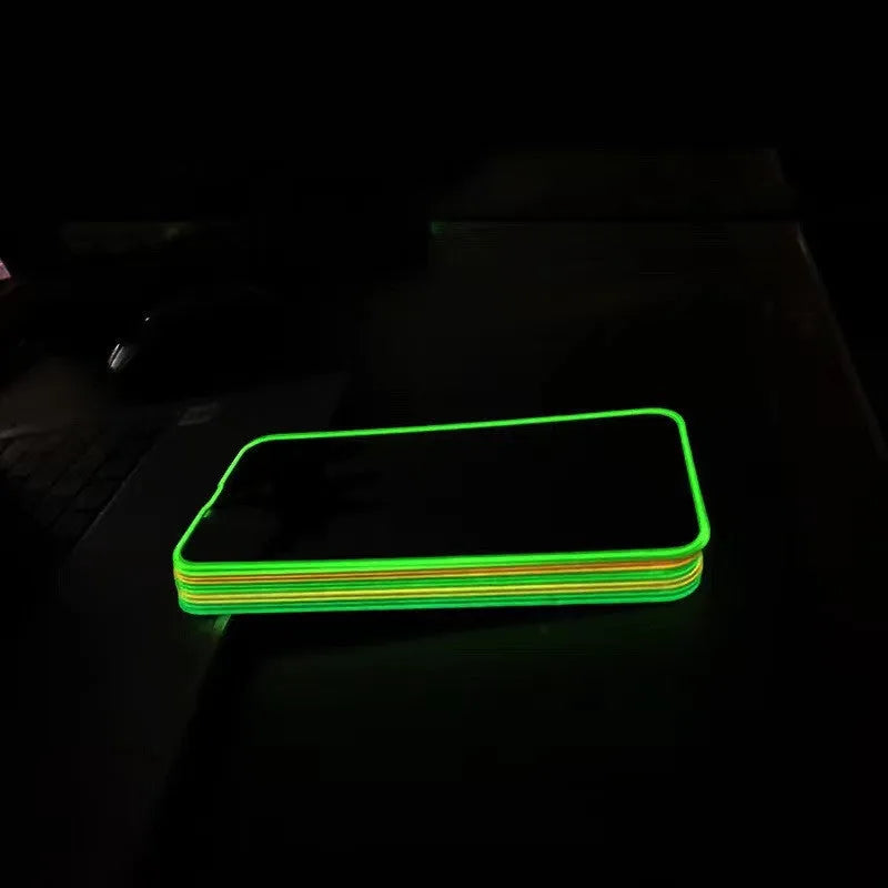 Luminous pink tempered glass screen protector fitted on an iPhone, showing full screen coverage and glow.