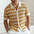 Blue American-style corrugated short-sleeved sweater with jacquard texture on a hanger.