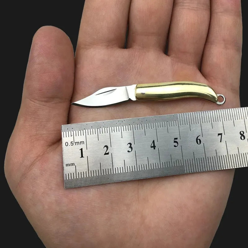 Brass mini folding knife keychain pendant with 3cm blade and 50mm or 60mm full length in five brass handle styles.