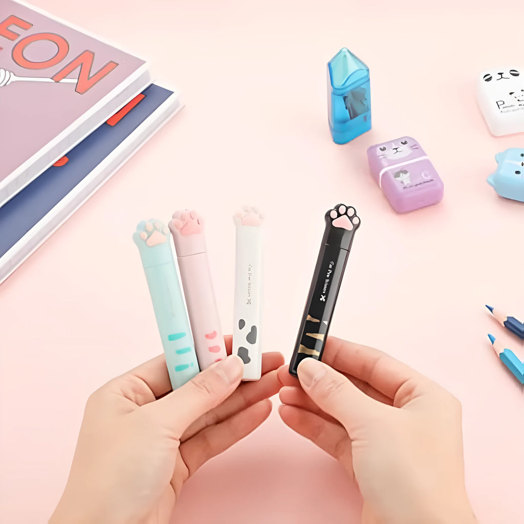 Cat paw mini folding scissors in four colours showing closed safety position and decorative handles