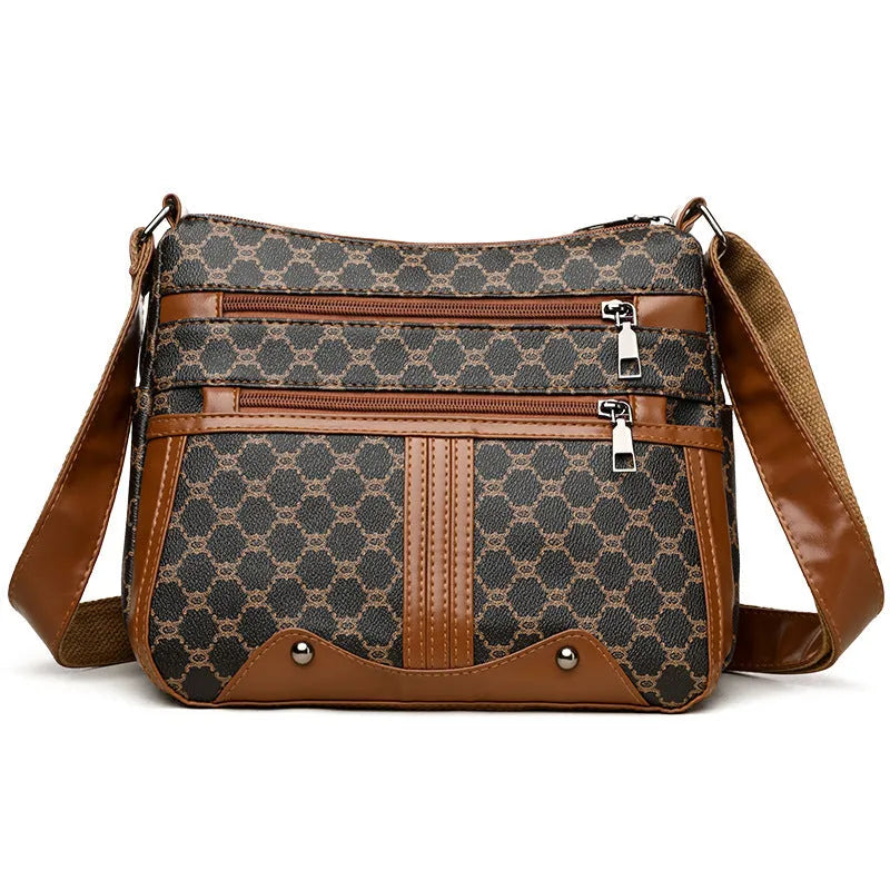Brown women's crossbody bag with stitching pattern detail and large capacity interior