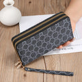 Long wallet clutch in PU leather with retro print design and zipper closure
