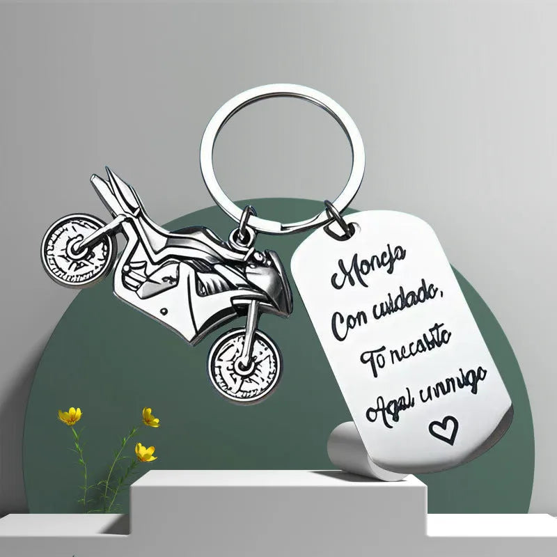 Stainless steel motorcycle keychain with inspirational design and protective flannel drawstring bag
