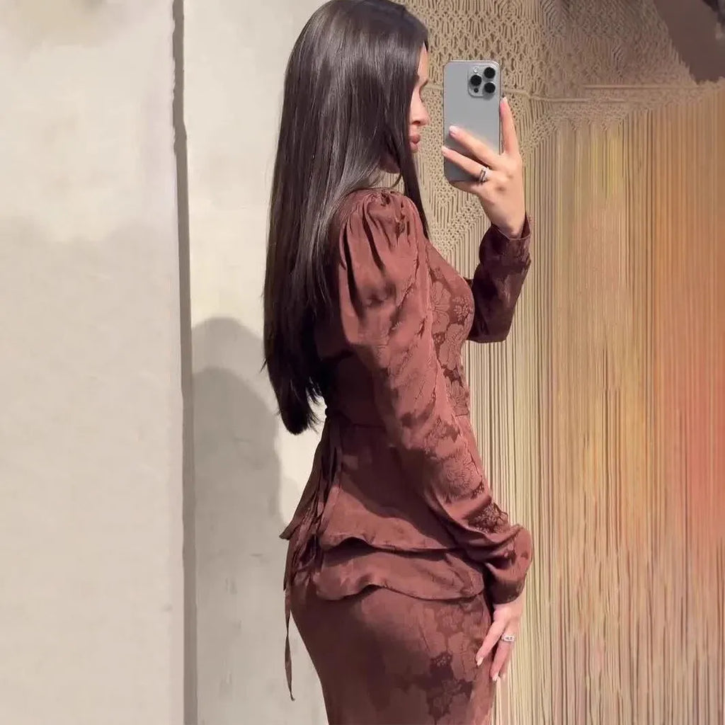 Dark brown artistic retro dress with plant pattern, long sleeves, and a fake two-piece design.