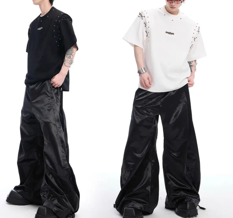 Black deconstruction lace-up cutout short sleeve t-shirt on a hanger
