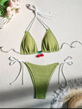 Nylon bikini swimsuit briefs in a solid colour on a mannequin