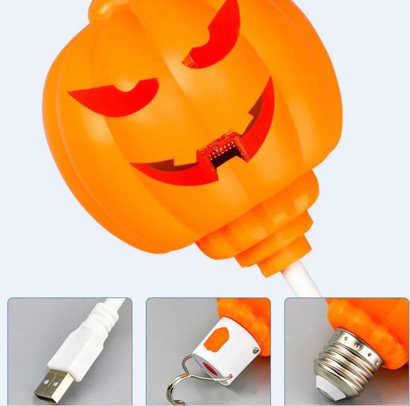 Plastic pumpkin-shaped decorative lamp with a USB cable, glowing either yellow or purple.
