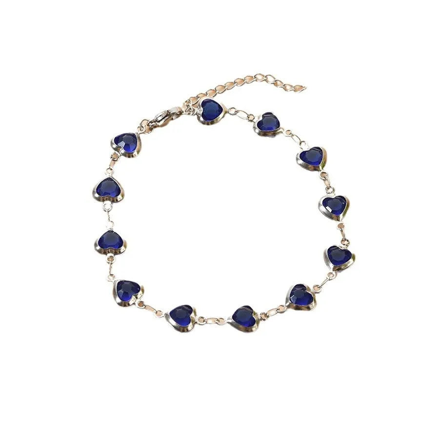 Geometric stainless steel heart bracelet showing six electroplated colour options on white background
