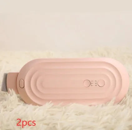 Pink menstrual heating pad with controller displaying temperature settings and vibration options