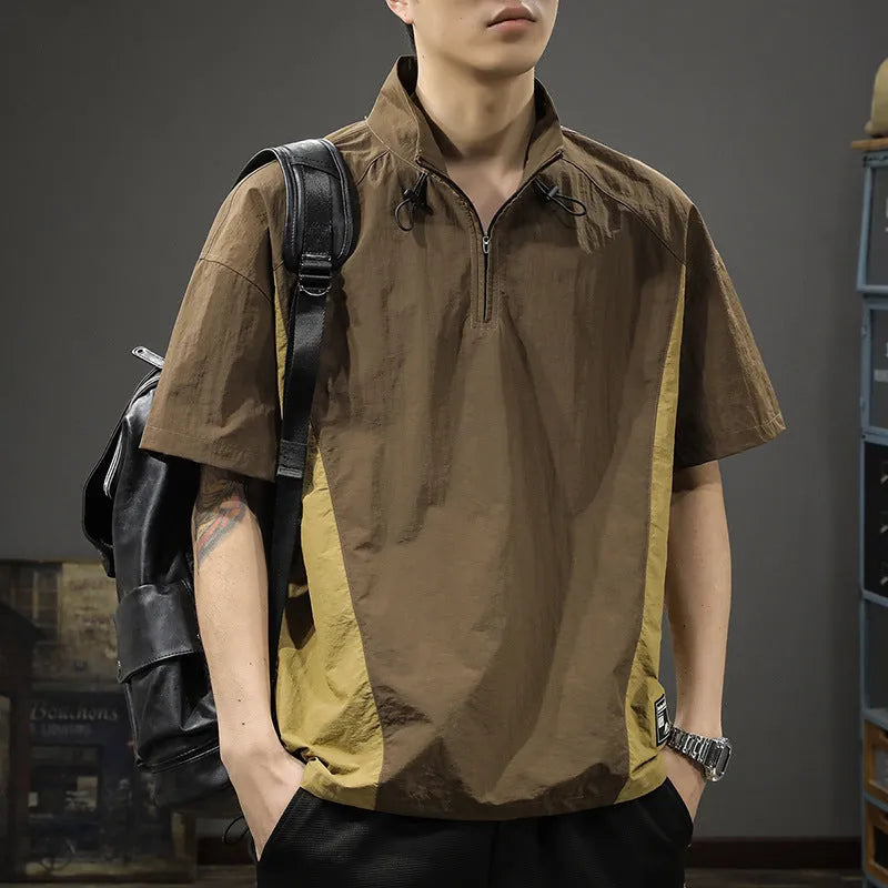 Brown men's half-zipped stand collar short-sleeved shirt on a hanger, showing fleece lining.