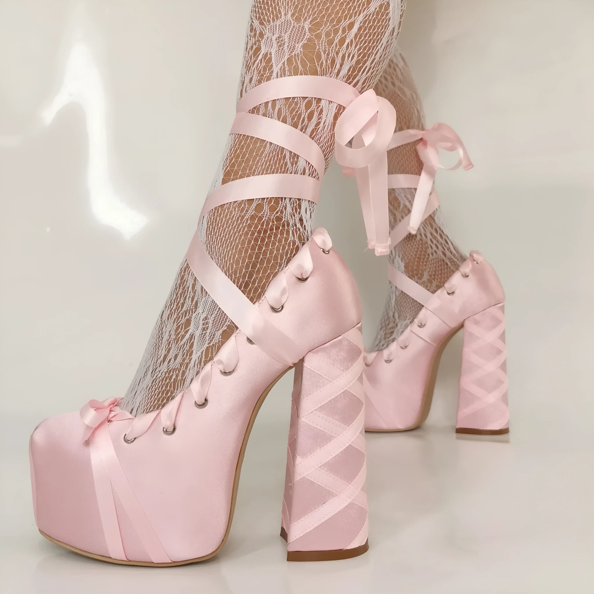 Pink imitation leather lace-up platform pumps with chunky heel and round toe