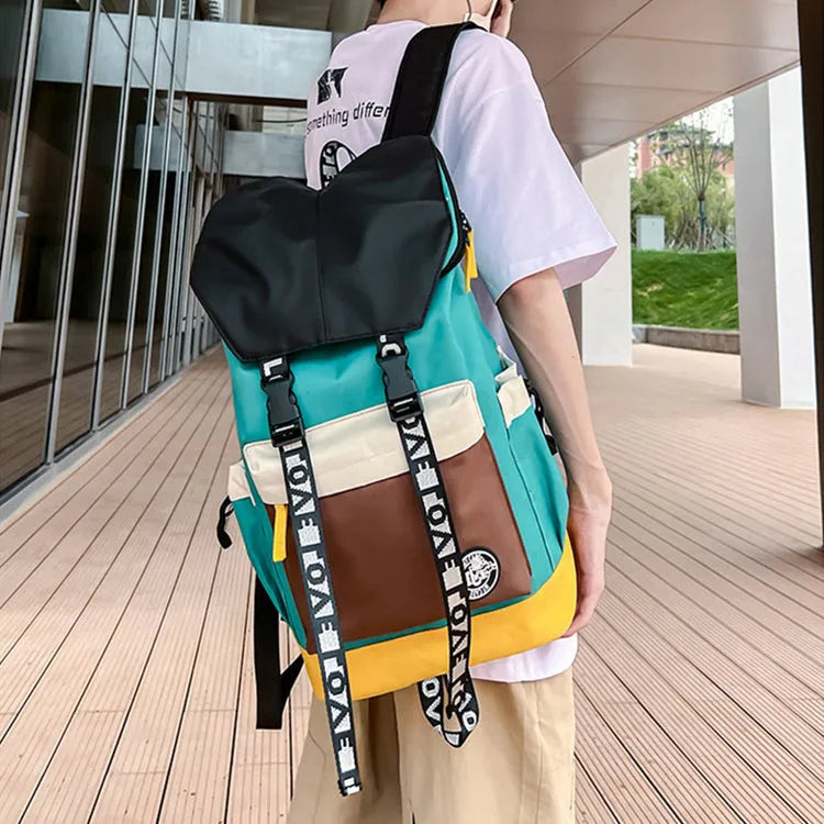 Oxford cloth backpack in black, green, or red colours showing handheld and shoulder straps.