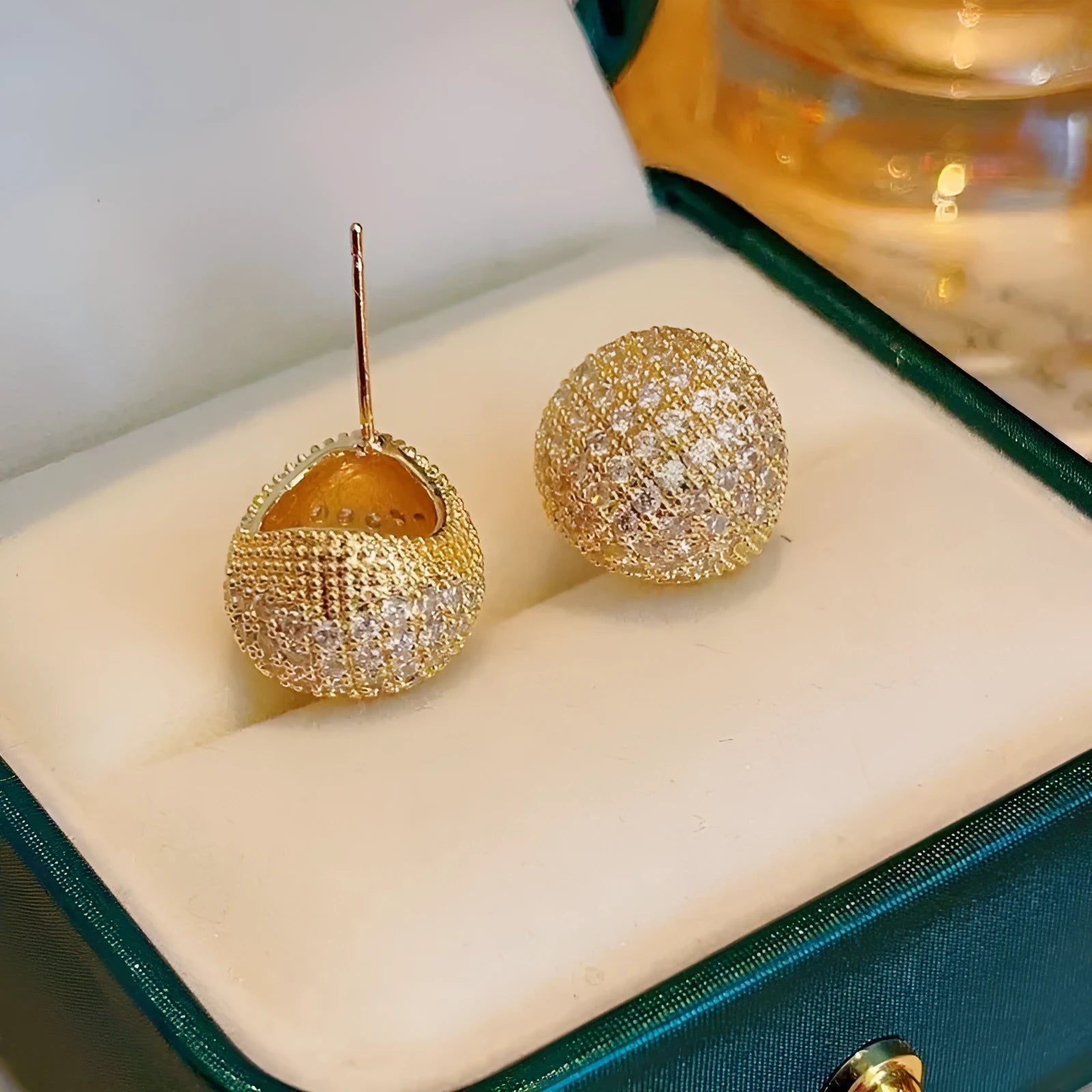 Gold and white little golden beans earrings with full diamond setting and drop-shaped geometric design