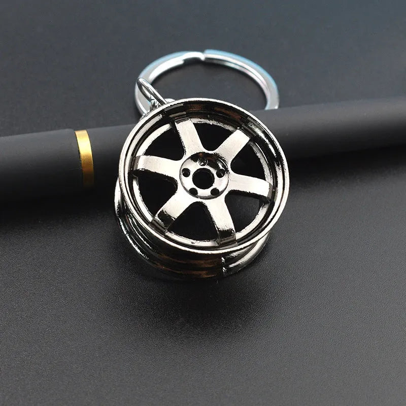 Wheel hub design metal keychain in zinc alloy with gold, silver or gun black finish