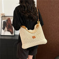 Large knitted tote beach bag with bucket shape and contrast stitching in black or brown colour options