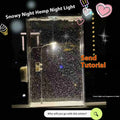 DIY snowy landscape night light kit with magic flowing snow effect and warm LED illumination for Christmas desktop decoration