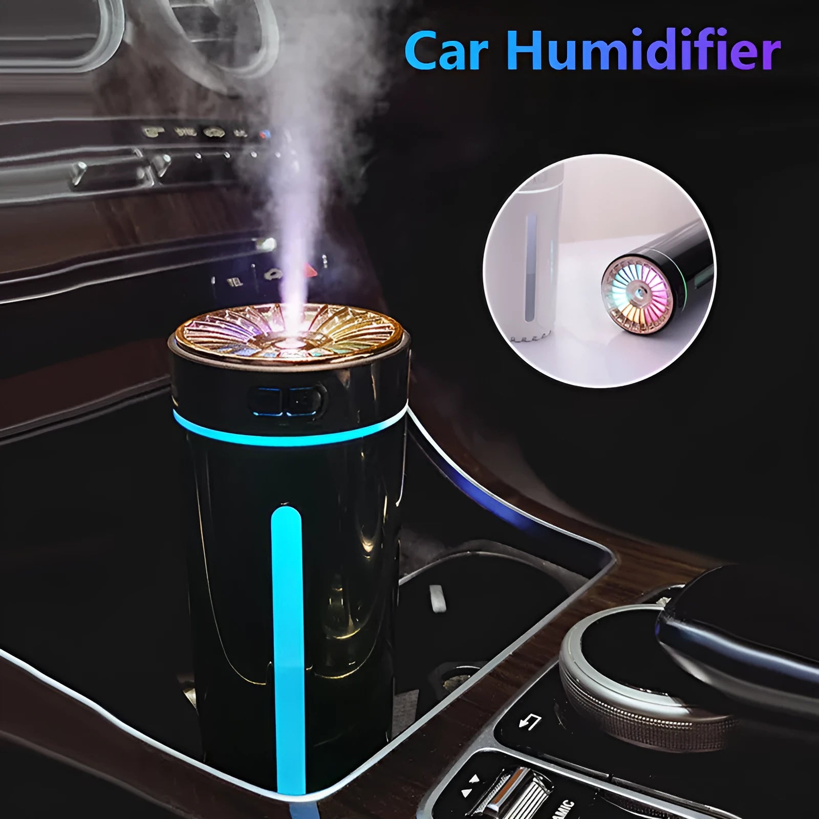 Black and white portable USB rechargeable car humidifier with colourful LED lights on a desk.