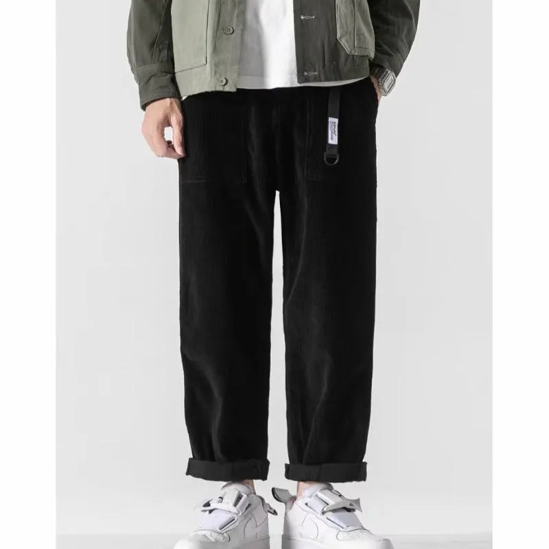 Loose straight tapered trousers with wide legs in dark grey, black, and khaki colours