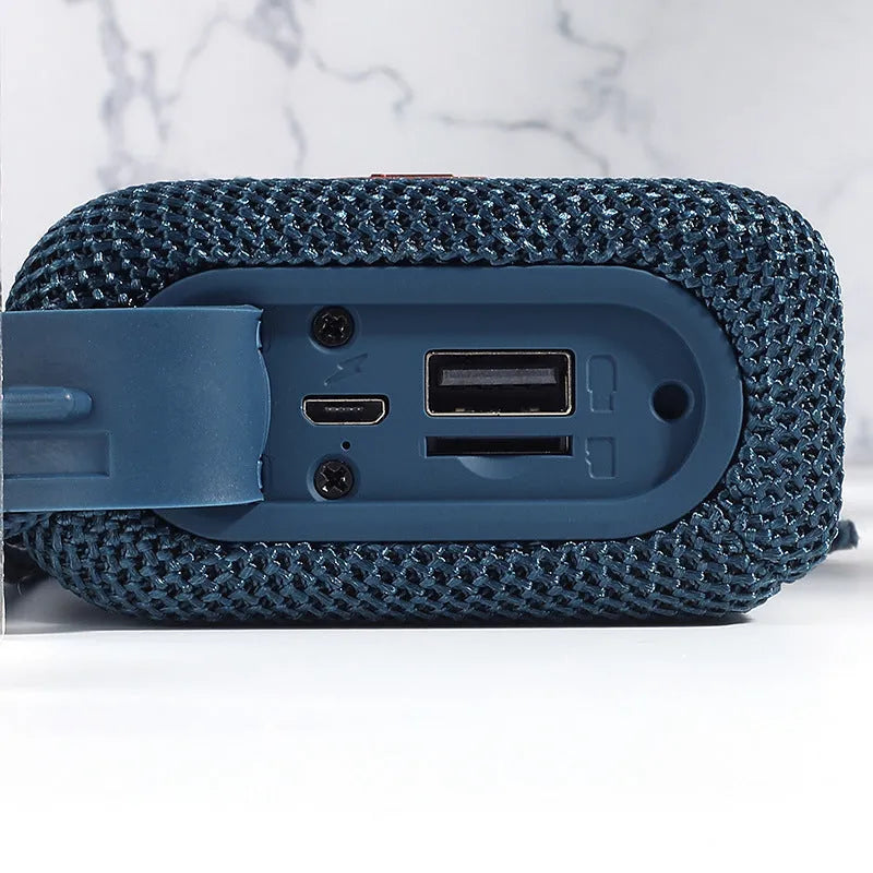 Wireless Bluetooth speaker in black, front view showing control buttons and grille, with double diaphragm subwoofer, 100x40x78mm