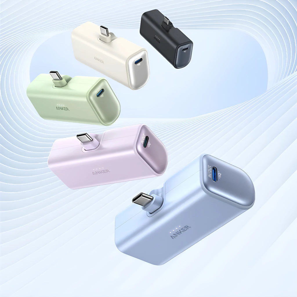 Compact capsule-shaped power bank in multiple colours with a fold-out USB-C cable.
