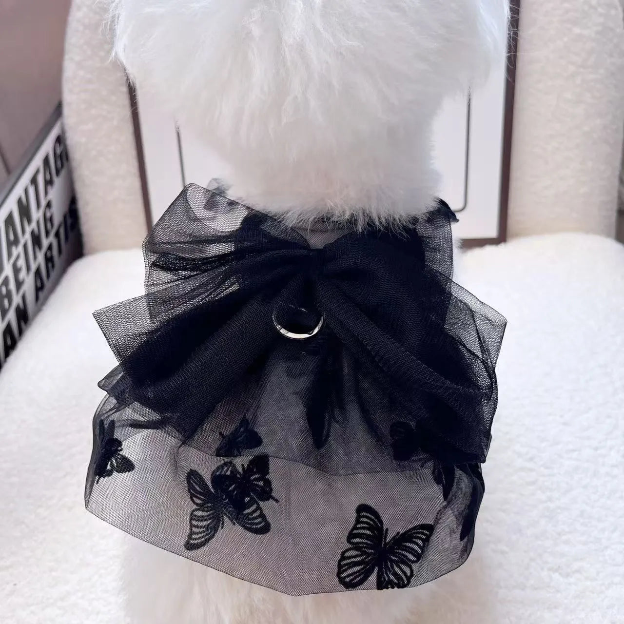 Black tulle princess skirt for a small dog or cat on a mannequin.