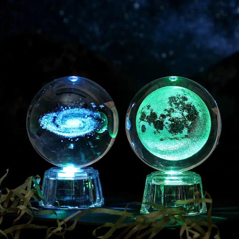 Transparent white crystal ball ornament with inner carving on a fixed base.