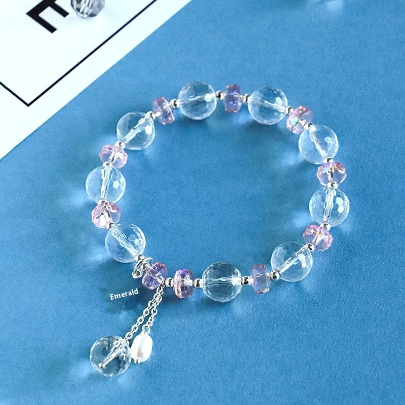 Women's white crystal bracelet with lucky cat charm and diamond design elements