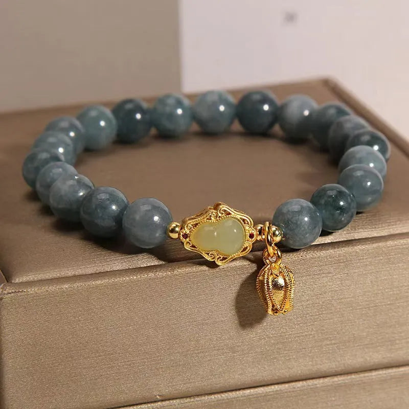 Sky blue natural stone gourd and lotus pendant bracelet for women with electroplated finish.