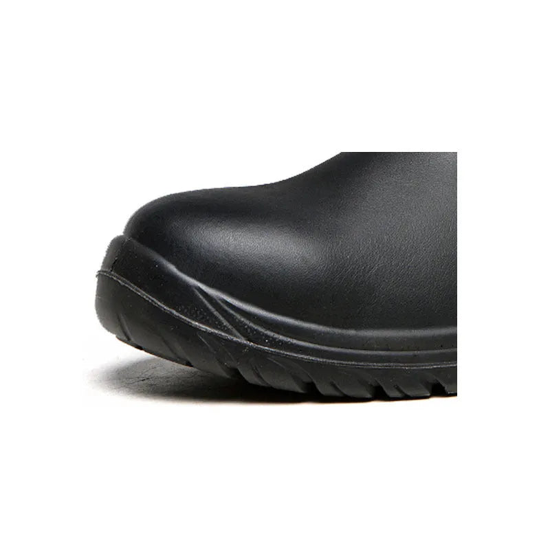 Black leather high-top safety work boots with anti-piercing soles on a white background