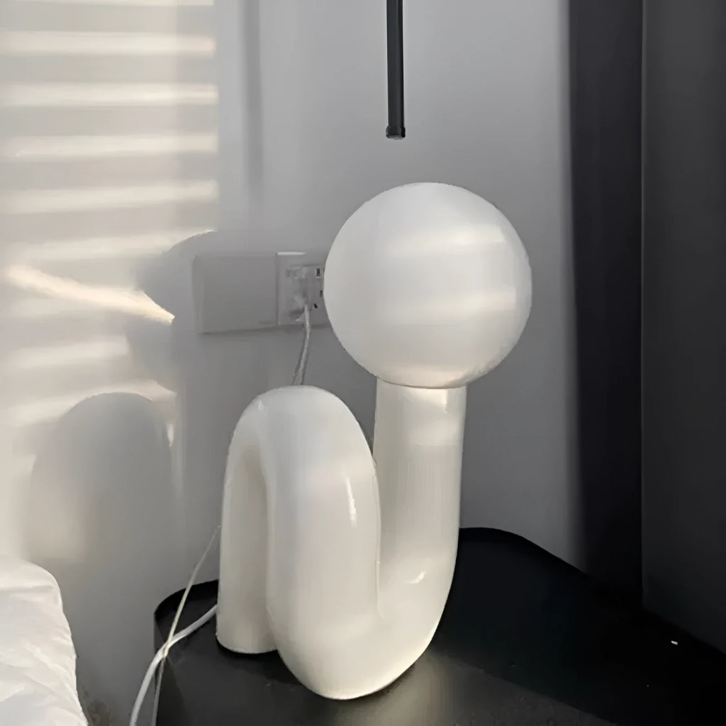 Modern Nordic style resin bedside lamp in pink with international plug adapter options