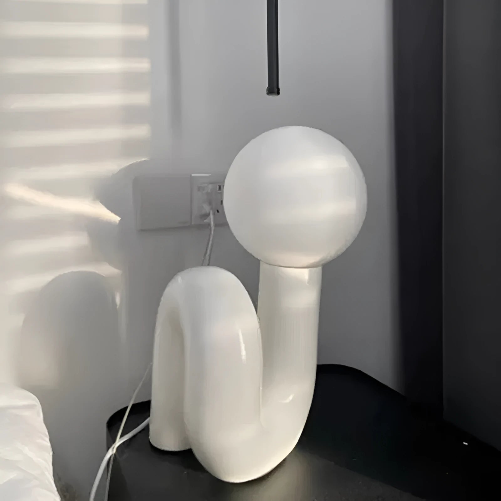 Modern Nordic style resin bedside lamp in pink with international plug adapter options